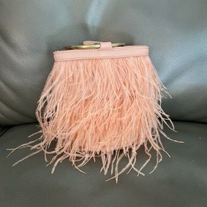 Anthropologie pink feather bag